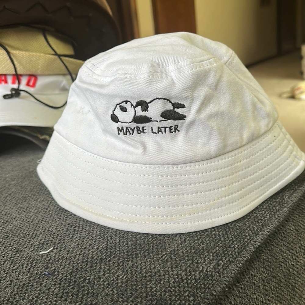 White bucket hat - maybe later bear sleeping hat